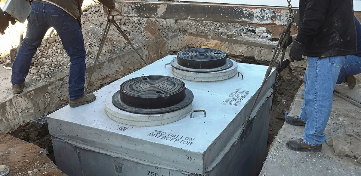 Grease trap installation for a commercial property drainage system in Baton Rouge, LA