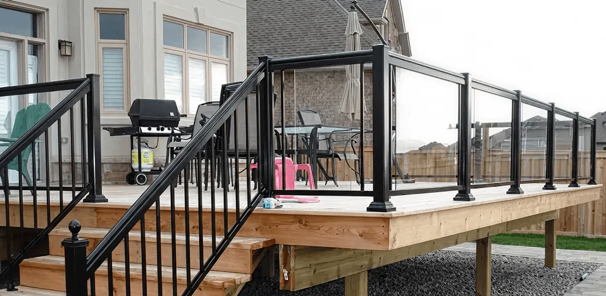 Handrail installation on a deck staircase for safety and code compliance in Baton Rouge, LA